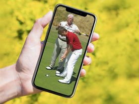 Person holding phone with Harold Swash on the screen.